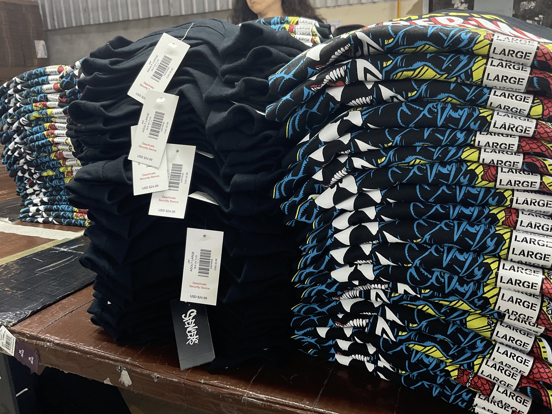 Folded and tagged garments ready for packaging